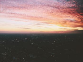 Aerial view of landscape against sky during sunset