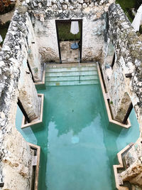 High angle view of swimming pool against building