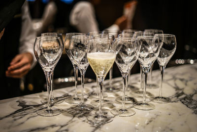 Close-up of wineglasses on table