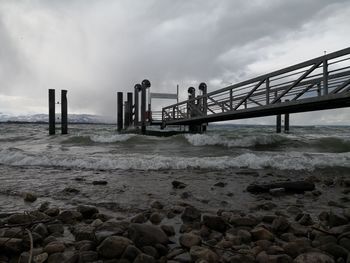 View of bridge over sea against sky, waves, lake constance