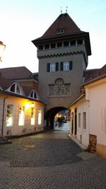 Narrow street along buildings