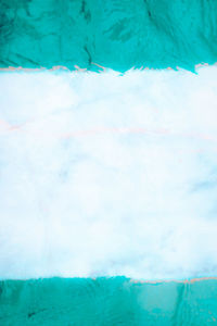 Close-up of swimming pool against sea