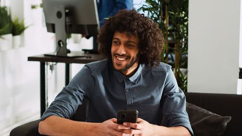 Young woman using mobile phone