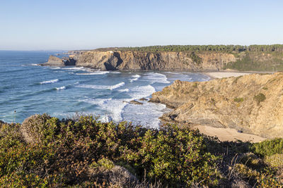 Scenic view of sea against clear sky