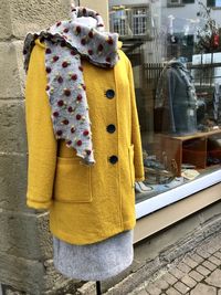 Close-up of clothes hanging on wall