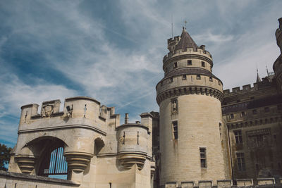 Low angle view of historic building against sky