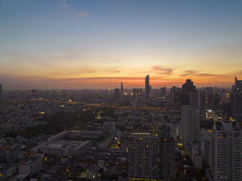 Modern cityscape of business district at sunset