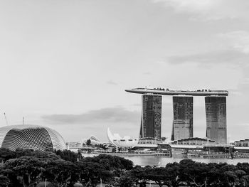 View of marina bay sand against cloudy sky