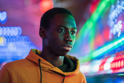 Portrait of young man looking away