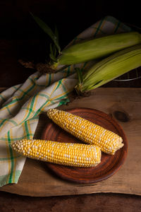 Close-up of corn on table