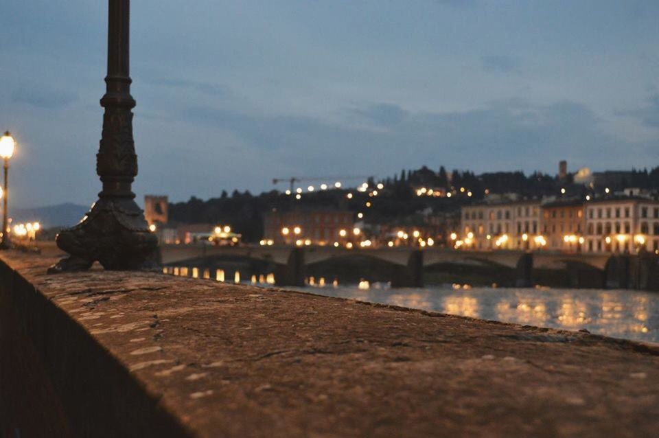 architecture, built structure, illuminated, building exterior, water, sky, night, reflection, river, surface level, dusk, city, travel destinations, famous place, outdoors, architectural column, lighting equipment, street light, waterfront, no people