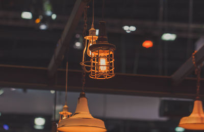 Low angle view of illuminated pendant light