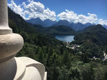 Scenic view of lake against cloudy sky