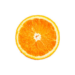 Close-up of orange slice against white background