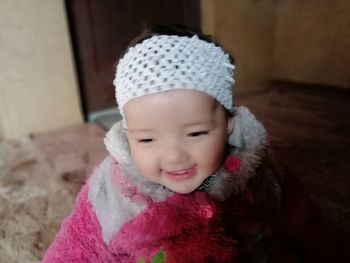 Portrait of cute girl wearing hat