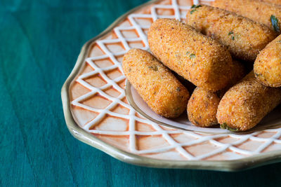 Vegetarian potato croquettes served in a serving dish