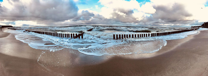 Panoramic view of beach against sky