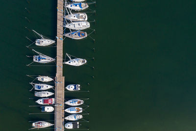 Directly above shot of ship hanging on wall