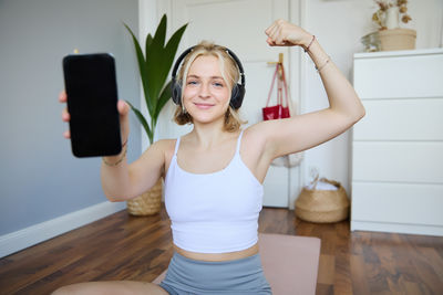 Young woman using mobile phone