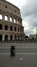 View of historical building against cloudy sky