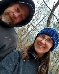 Portrait of a smiling young woman in snow