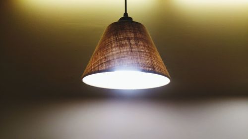 Low angle view of illuminated pendant light