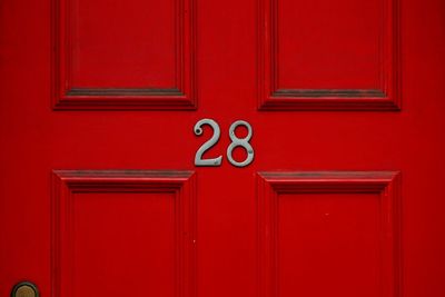 Close-up of closed red door
