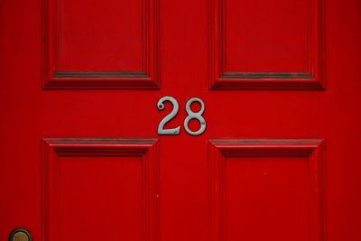 Close-up of closed red door