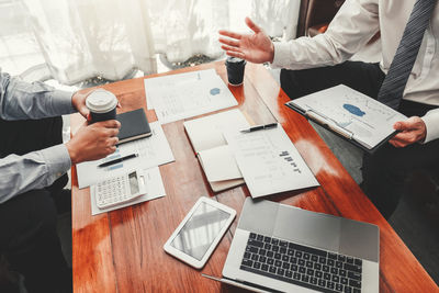 Business colleagues working on table