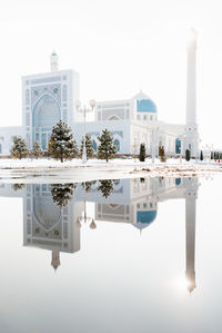 Tashkent, uzbekistan. december 2020. white mosque minor in winter on a sunny day