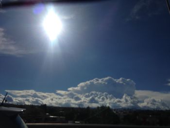 Scenic view of landscape against blue sky