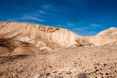 Scenic view of desert against sky