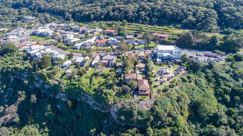 High angle view of townscape and trees in city