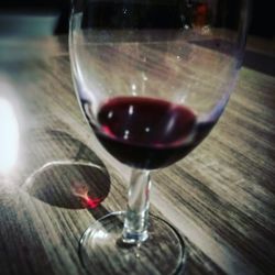 Close-up of wineglass on table