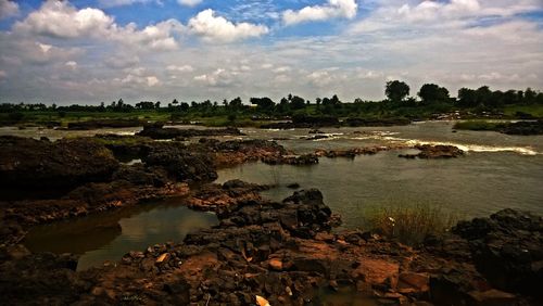 Scenic view of river against sky