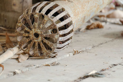 Close-up of pump on floor