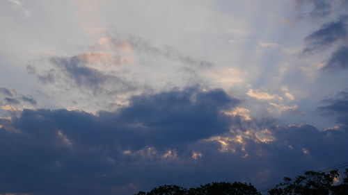 Low angle view of clouds in sky during sunset