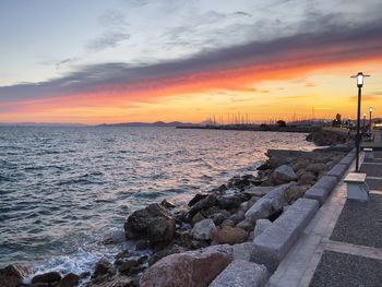 Scenic view of sea against sky during sunset