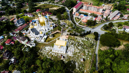 High angle view of street amidst buildings in town