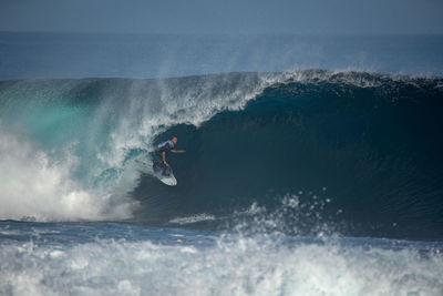 Man surfing in sea