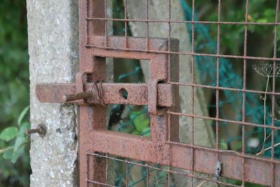 Close-up of rusty metal fence