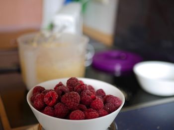 Close-up of strawberries in bowl on table