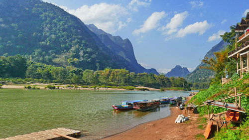 Boats moored in bay