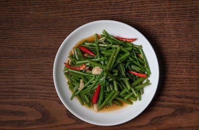 High angle view of salad in bowl on table