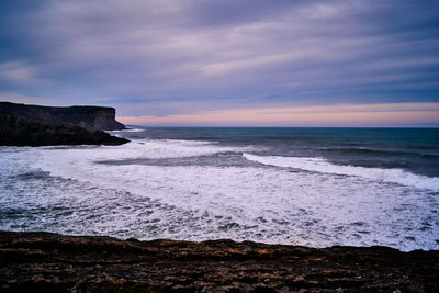 Scenic view of sea against sky during sunset