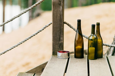 Close-up of wine bottles on table