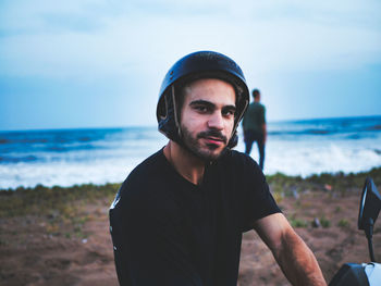 Portrait of young man on beach