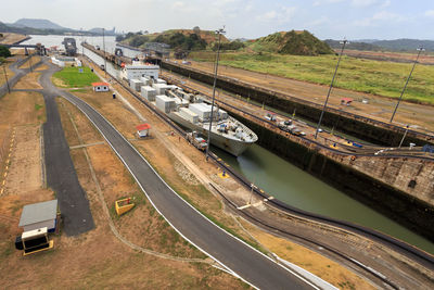 High angle view of cars on road against sky