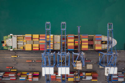 Container ship terminal, and quay crane of container ship at industrial port with shipping container 