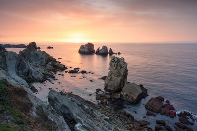 Scenic view of sea against sky during sunset